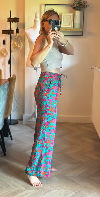 Pantalon fluide large imprimé rose et turquoise T.34 neuf