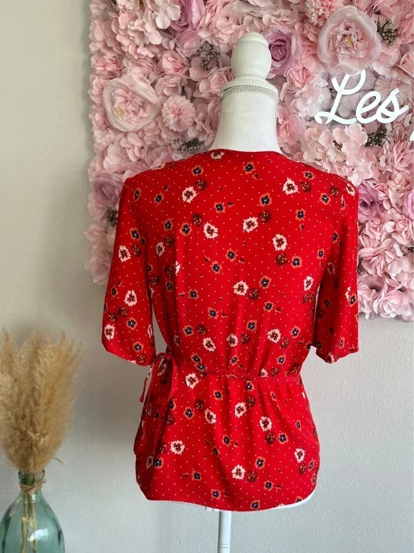 Blouse portefeuille rouge à motifs fleuris T.34