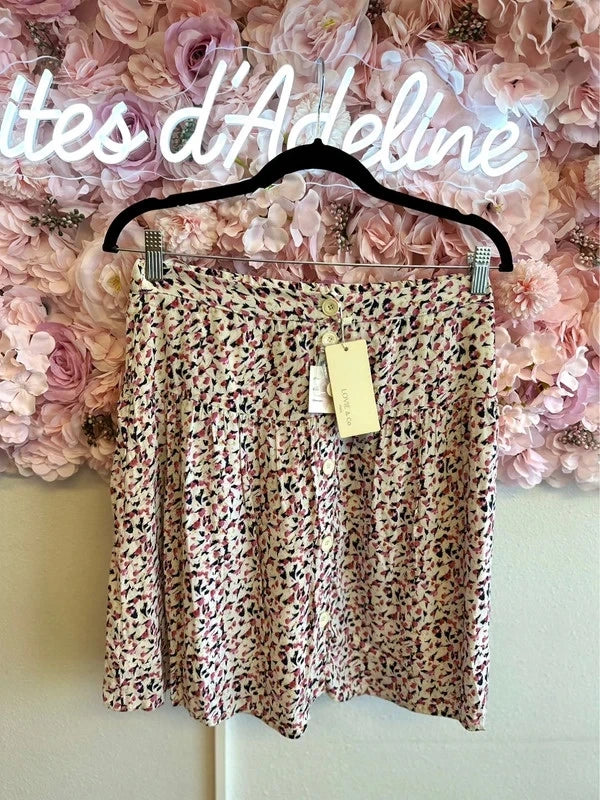 Jupe fluide à motifs blanc et rose neuve T.40/42
