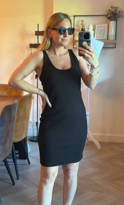 Robe courte noire dos ouvert texturée T.38