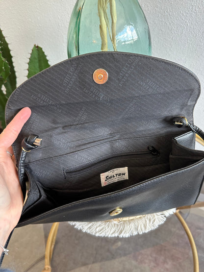 Sac pochette en bandoulière en cuir vintage