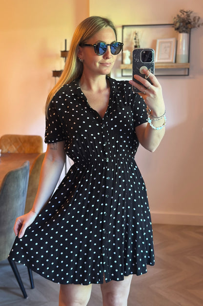 Robe courte noire à pois blancs style pin-up T.34