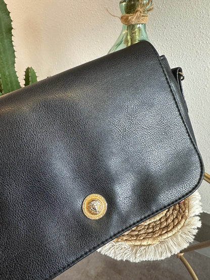 Sac en bandoulière noire en cuir avec détails dorés vintage