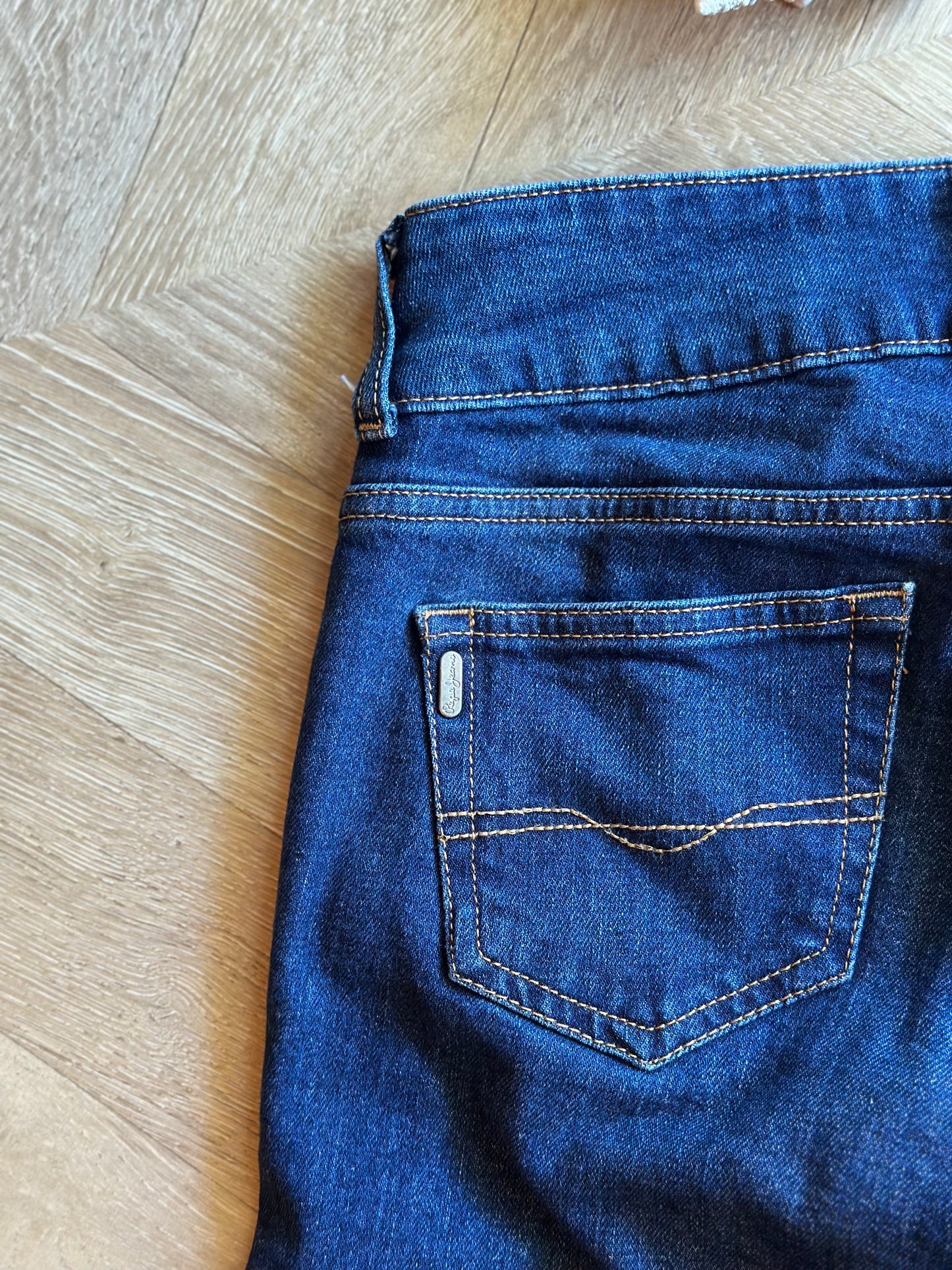 Jean flare bleu brut taille basse coton T.36